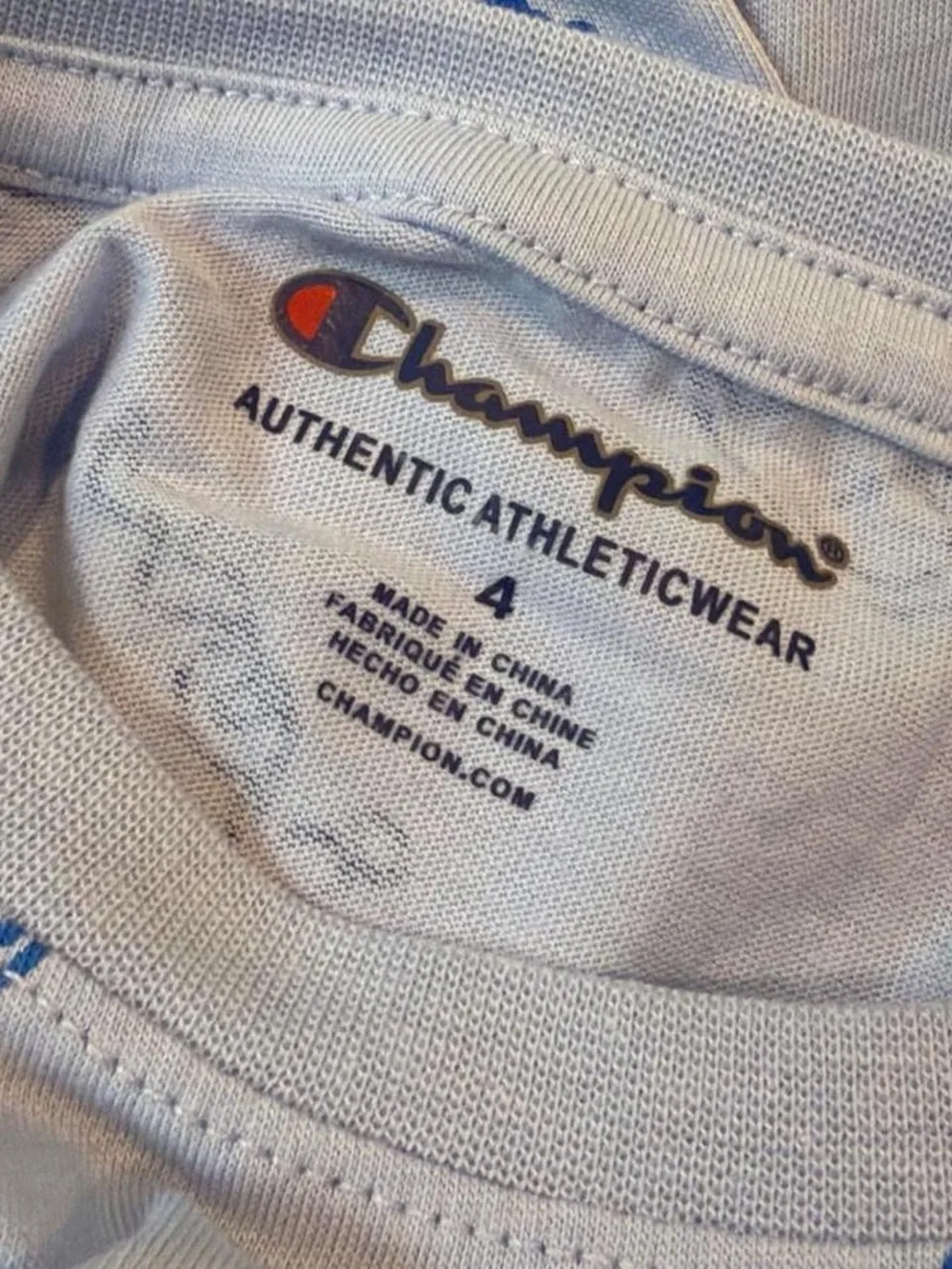 Champion Boy’s Light Blue Tee with Navy Allover Logo